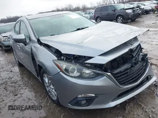 2015 Mazda 3 i Grand Touring with VIN JM1BM1W79F1256535, listed as a IAAI auction lot 41474347 with 128,573 mi miles and . Bid and sale history available at DreamBid. Image 1.