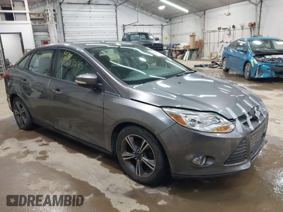 2014 Ford Focus SE with VIN 1FADP3F24EL310431, listed as a IAAI auction lot 41997295 with 108,718 mi miles. Bid and sale history available at carsss.com. Image 1.