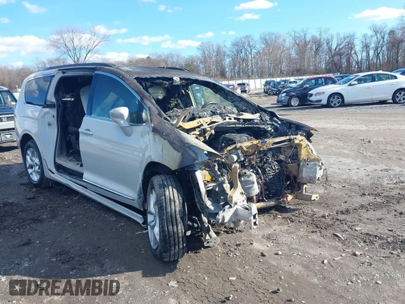 2017 Chrysler Pacifica Touring L z VIN 2C4RC1BGXHR794828, wystawiony jako IAAI lot #41213132 z przebiegiem Nie podano mil oraz . Historia ofert i sprzedaży dostępna na DreamBid. Obrazek 1.