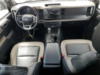 2022 Ford Bronco z VIN 1FMEE5DP4NLB67541, wystawiony jako Copart lot #58427485 z przebiegiem 67 774 mil mil oraz Szkoda całkowita • Salvage title. Historia ofert i sprzedaży dostępna na DreamBid. Obrazek 8.