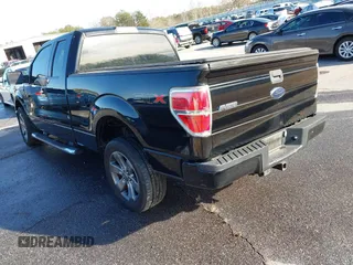 2009 Ford F-150 STX with VIN 1FTRX12WX9FA69251, listed as a IAAI auction lot 41341658 with 169,074 mi miles. Bid and sale history available at carsss.com. Image 3.