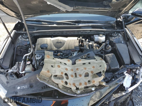 2019 Toyota Camry Hybrid LE z VIN 4T1B21HK1KU516390, wystawiony jako Copart lot #54856015 z przebiegiem 94 504 mil mil oraz Nie do naprawy • Non repairable. Historia ofert i sprzedaży dostępna na DreamBid. Obrazek 11.