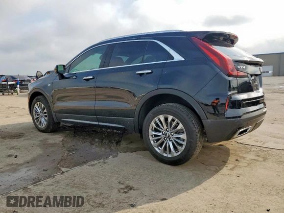 2024 Cadillac XT4 FWD Premium Luxury with VIN 1GYFZCR49RF248341, listed as a Copart auction lot 58586035 with 12,490 mi miles and Salvage title. Bid and sale history available at DreamBid. Image 2.