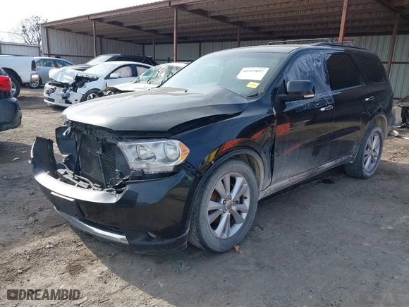 2013 Dodge Durango Crew with VIN 1C4RDHDG2DC695121, listed as a IAAI auction lot 41225057 with 118,458 mi miles. Bid and sale history available at carsss.com. Image 2.