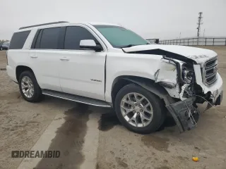 2015 GMC Yukon SLE with VIN 1GKS1AKC8FR733084, listed as a Copart auction lot 82960064 with 163,576 mi miles and Salvage Title. Bid and sale history available at carsss.com. Image 4.