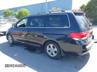 2008 Honda Odyssey Touring with VIN 5FNRL38948B116432, listed as a IAAI auction lot 42162566 with 121,996 mi miles. Bid and sale history available at carsss.com. Image 3.