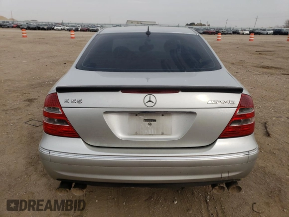 2005 Mercedes-Benz E-Class 5.5L AMG with VIN WDBUF76J05A730404, listed as a Copart auction lot 78168554 with 154,164 mi miles and Clean Title. Bid and sale history available at carsss.com. Image 6.