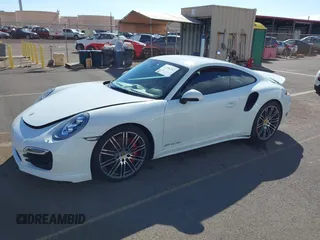 2015 Porsche 911 Turbo S with VIN WP0AD2A98FS167057, listed as a IAAI auction lot 41296392 with 1 mi miles. Bid and sale history available at carsss.com. Image 2.
