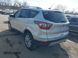 2017 Ford Escape Titanium with VIN 1FMCU0JD3HUB13234, listed as a IAAI auction lot 41760944 with 113,361 mi miles. Bid and sale history available at carsss.com. Image 3.