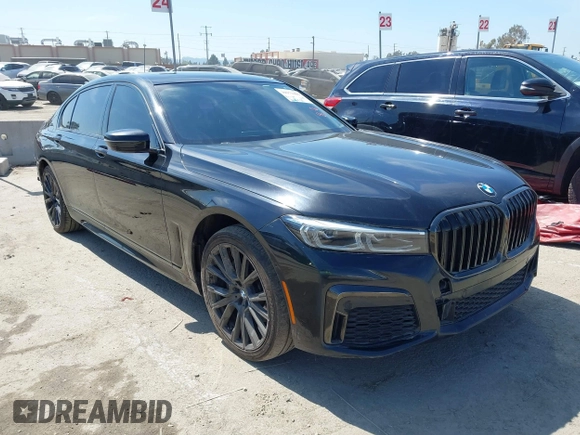 2022 BMW 7 Series 740i with VIN WBA7T2C07NCG88615, listed as a IAAI auction lot 39972481 with 76,169 mi miles. Bid and sale history available at carsss.com. Image 1.