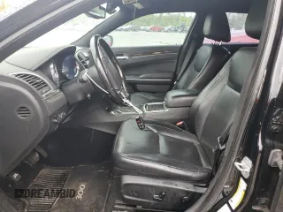 2013 Chrysler 300 with VIN 2C3CCAET1DH568910, listed as a Copart auction lot 50037004 with 136,228 mi miles and Salvage Title. Bid and sale history available at carsss.com. Image 7.