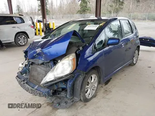2009 Honda Fit Sport with VIN JHMGE88459C001743, listed as a IAAI auction lot 41852048 with 128,225 mi miles. Bid and sale history available at carsss.com. Image 18.