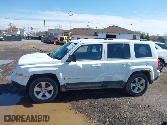 2014 Jeep Patriot Latitude with VIN 1C4NJPFA8ED550221, listed as a IAAI auction lot 41919419 with 185,386 mi miles and . Bid and sale history available at carsss.com. Image 14.