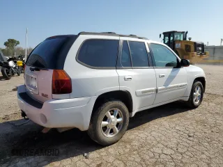 2005 GMC Envoy SLT with VIN 1GKDT13S852185958, listed as a Copart auction lot 68736194 with 225,398 mi miles and Salvage Title. Bid and sale history available at DreamBid. Image 3.