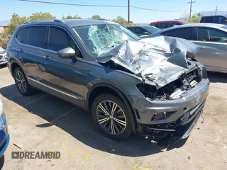2018 Volkswagen Tiguan SEL z VIN 3VV2B7AX7JM177796, wystawiony jako IAAI lot #42105579 z przebiegiem 56 521 mil mil oraz . Historia ofert i sprzedaży dostępna na DreamBid. Obrazek 1.