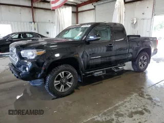 2016 Toyota Tacoma SR5 with VIN 5TFSZ5AN1GX017462, listed as a Copart auction lot 64584205 with 164,131 mi miles and Salvage title. Bid and sale history available at DreamBid. Image 1.