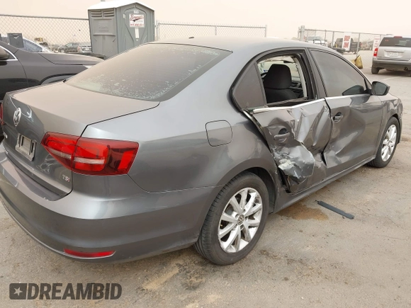 2017 Volkswagen Jetta S with VIN 3VW2B7AJ9HM412779, listed as a IAAI auction lot 41723456 with 114,151 mi miles and . Bid and sale history available at DreamBid. Image 4.