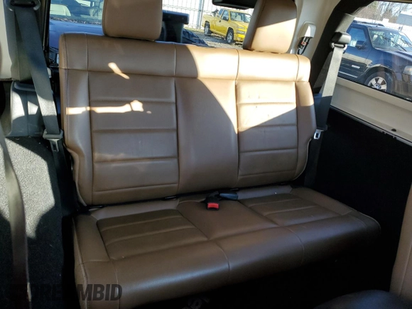 2011 Jeep Wrangler Sahara with VIN 1J4GA5D14BL628876, listed as a Copart auction lot 87317374 with 84,179 mi miles and Salvage Title. Bid and sale history available at DreamBid. Image 10.