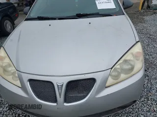 2006 Pontiac G6 6-Cyl z VIN 1G2ZG558464228524, wystawiony jako IAAI lot #42375602 z przebiegiem 172 972 mil mil oraz . Historia ofert i sprzedaży dostępna na DreamBid. Obrazek 10.