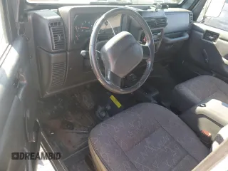 2002 Jeep Wrangler Sport with VIN 1J4FA49S22P703610, listed as a Copart auction lot 50900605 with 70,045 mi miles and Salvage Title. Bid and sale history available at carsss.com. Image 8.