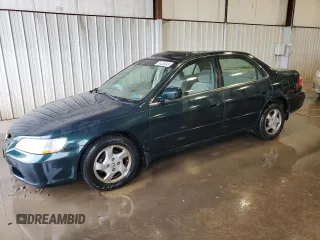 1999 Honda Accord EX with VIN 1HGCG6671XA099644, listed as a Copart auction lot 61426345 with 91,940 mi miles and Salvage title. Bid and sale history available at DreamBid. Image 1.