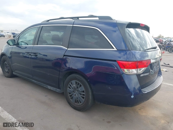 2014 Honda Odyssey LX with VIN 5FNRL5H23EB013044, listed as a IAAI auction lot 41644270 with 244,271 mi miles. Bid and sale history available at carsss.com. Image 3.