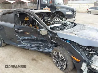 2016 Honda Civic EX-L z VIN 19XFC1F73GE033247, wystawiony jako IAAI lot #41910941 z przebiegiem Nie podano mil oraz . Historia ofert i sprzedaży dostępna na DreamBid. Obrazek 12.