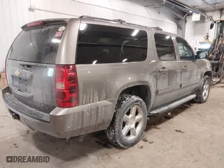 2013 Chevrolet Suburban LT with VIN 1GNSKJE76DR375916, listed as a IAAI auction lot 41588724 with 281,808 mi miles. Bid and sale history available at carsss.com. Image 4.