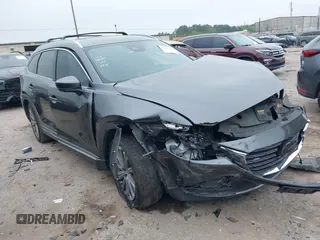 2021 Mazda CX-9 Signature with VIN JM3TCBEY3M0505266, listed as a IAAI auction lot 41835730 with 90,678 mi miles and . Bid and sale history available at DreamBid. Image 1.