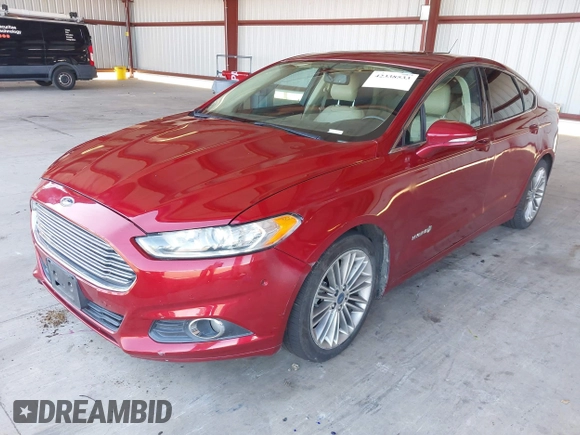 2013 Ford Fusion SE Hybrid z VIN 3FA6P0LU9DR183625, wystawiony jako IAAI lot #42338533 z przebiegiem 159 546 mil mil oraz . Historia ofert i sprzedaży dostępna na DreamBid. Obrazek 2.