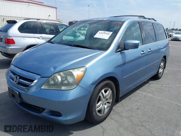 2006 Honda Odyssey EX-L z VIN 5FNRL38706B075356, wystawiony jako IAAI lot #42021960 z przebiegiem 120 455 mil mil oraz . Historia ofert i sprzedaży dostępna na DreamBid. Obrazek 2.