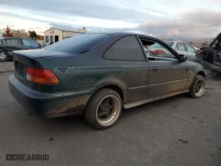 1999 Honda Civic DX with VIN 1HGEJ6223XL022105, listed as a Copart auction lot 82823084 with 288,187 mi miles and Salvage Title. Bid and sale history available at carsss.com. Image 3.