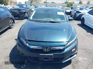 2018 Honda Clarity Touring with VIN JHMZC5F3XJC006383, listed as a IAAI auction lot 41996524 with 100,646 mi miles and . Bid and sale history available at DreamBid. Image 12.