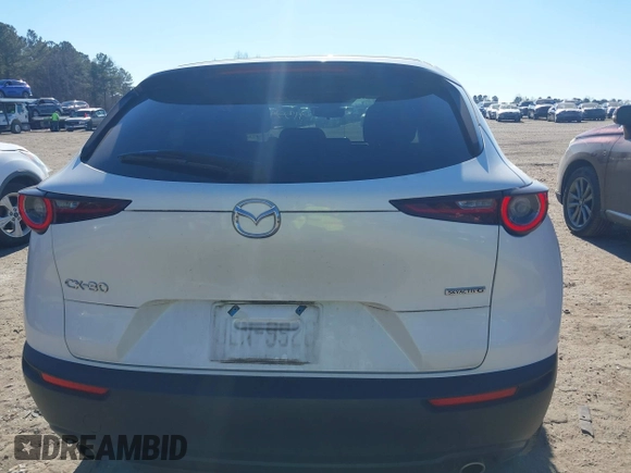 2021 Mazda CX-30 Select with VIN 3MVDMABL3MM239692, listed as a IAAI auction lot 41354738 with 48,928 mi miles and . Bid and sale history available at DreamBid. Image 17.