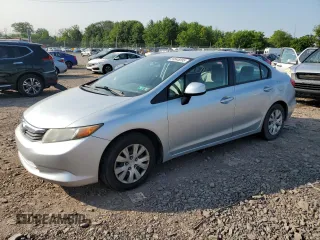 2012 Honda Civic LX z VIN 2HGFB2F54CH563668, wystawiony jako Copart lot #59545095 z przebiegiem 152 736 mil mil oraz Szkoda całkowita • Salvage title. Historia ofert i sprzedaży dostępna na DreamBid. Obrazek 1.