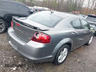 2013 Dodge Avenger SXT with VIN 1C3CDZCB5DN621881, listed as a IAAI auction lot 41739476 with 245,816 mi miles and . Bid and sale history available at DreamBid. Image 4.