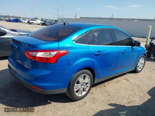 2012 Ford Focus SEL with VIN 1FAHP3H25CL415314, listed as a IAAI auction lot 41849302 with 164,022 mi miles. Bid and sale history available at carsss.com. Image 4.
