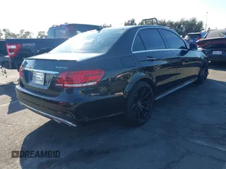2014 Mercedes-Benz E-Class E 250 BlueTEC Luxury with VIN WDDHF0EB9EA912094, listed as a IAAI auction lot 41329405 with 122,503 mi miles. Bid and sale history available at carsss.com. Image 4.