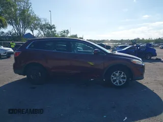 2011 Mazda CX-9 Touring with VIN JM3TB2CA6B0328864, listed as a IAAI auction lot 42029203 with 98,022 mi miles and . Bid and sale history available at DreamBid. Image 14.