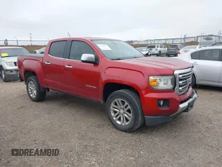 2015 GMC Canyon 2WD SLT with VIN 1GTG5CE3XF1211164, listed as a IAAI auction lot 41490387 with 163,932 mi miles. Bid and sale history available at carsss.com. Image 1.
