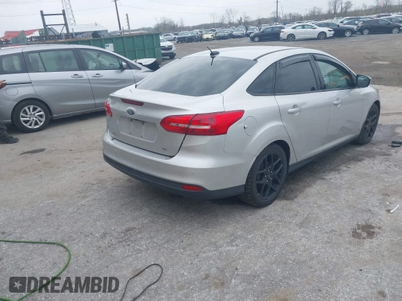 2015 Ford Focus SE with VIN 1FADP3F29FL258781, listed as a IAAI auction lot 41963223 with 121,286 mi miles and . Bid and sale history available at DreamBid. Image 4.