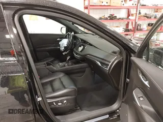 2020 Cadillac XT4 AWD Sport with VIN 1GYFZFR43LF090264, listed as a IAAI auction lot 41261586 with 65,859 mi miles and . Bid and sale history available at DreamBid. Image 5.