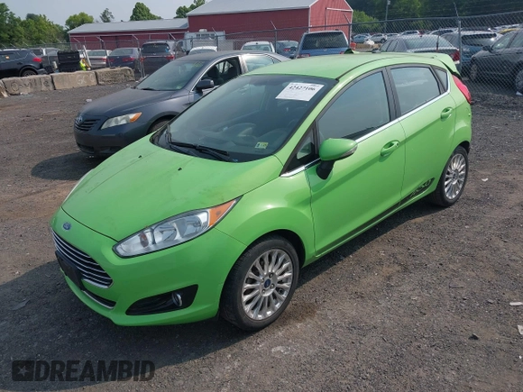 2014 Ford Fiesta Titanium z VIN 3FADP4FJXEM226724, wystawiony jako IAAI lot #42427106 z przebiegiem 63 302 mil mil oraz . Historia ofert i sprzedaży dostępna na DreamBid. Obrazek 2.
