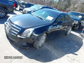 2010 Cadillac CTS Luxury with VIN 1G6DE5EG3A0130073, listed as a IAAI auction lot 41723779 with 152,217 mi miles. Bid and sale history available at carsss.com. Image 2.