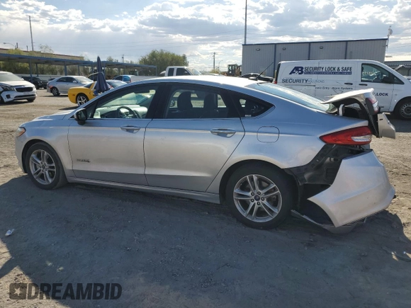 2018 Ford Fusion SE z VIN 3FA6P0LU7JR139974, wystawiony jako Copart lot #69819394 z przebiegiem 164 123 mil mil oraz Szkoda całkowita • Salvage title. Historia ofert i sprzedaży dostępna na DreamBid. Obrazek 2.