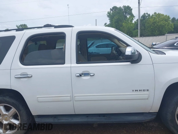 2013 Chevrolet Tahoe LS with VIN 1GNSCAE01DR260799, listed as a IAAI auction lot 42496680 with 199,276 mi miles and . Bid and sale history available at DreamBid. Image 14.