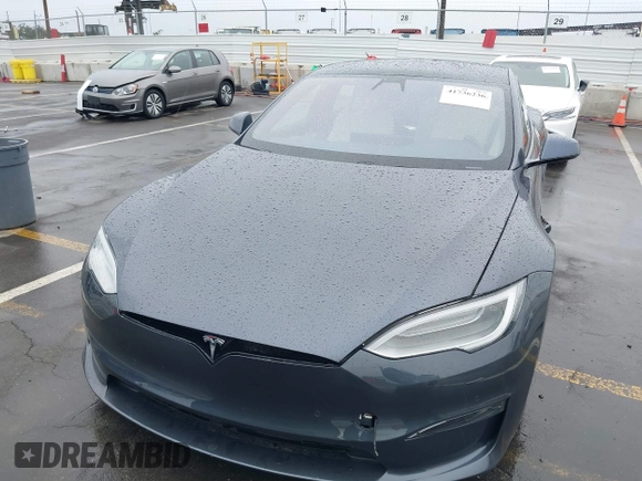 2022 Tesla Model S with VIN 5YJSA1E52NF459460, listed as a IAAI auction lot 41736236 with Not Provided miles and . Bid and sale history available at DreamBid. Image 12.