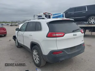 2018 Jeep Cherokee Latitude with VIN 1C4PJLCBXJD558927, listed as a IAAI auction lot 41942214 with 84,289 mi miles. Bid and sale history available at carsss.com. Image 3.