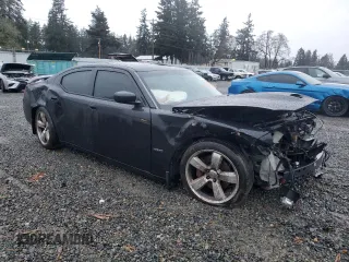 2006 Dodge Charger SRT-8 with VIN 2B3LA73W76H512508, listed as a Copart auction lot 86312114 with 177,592 mi miles and Salvage Title. Bid and sale history available at DreamBid. Image 4.