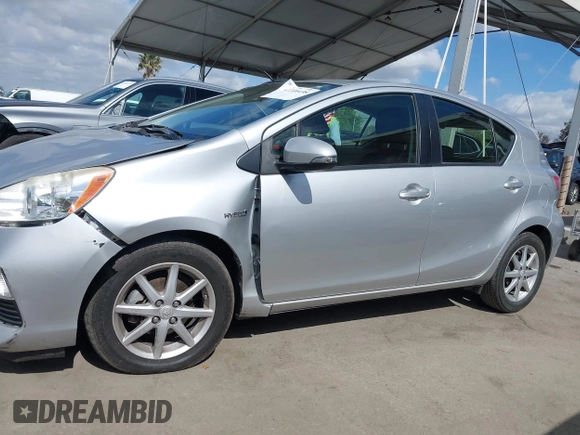 2013 Toyota Prius One z VIN JTDKDTB34D1049949, wystawiony jako IAAI lot #42246438 z przebiegiem 68 203 mil mil oraz . Historia ofert i sprzedaży dostępna na DreamBid. Obrazek 14.